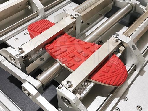 Shoe sole flexing tester used during a repeated bending test