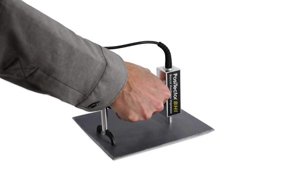 PosiTector BHI Barcol Hardness Impressor measuring fiber-reinforced plastic