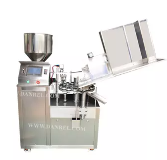 Industrial machine for filling and sealing aluminum tubes in a production environment