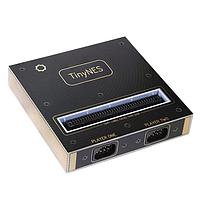 Tall Dog Electronics TD-TNES-GC Evaluation Modules One TinyNES system, which includes a TinyNES console (with RP2A03 and RP2C02 chips), one USB Type-C cable for power, one dual RCA cable, and one US USB Type-C wall power adapter.