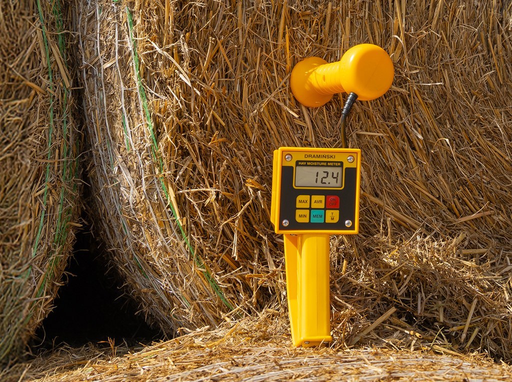 Hay being prepared for drying and storage