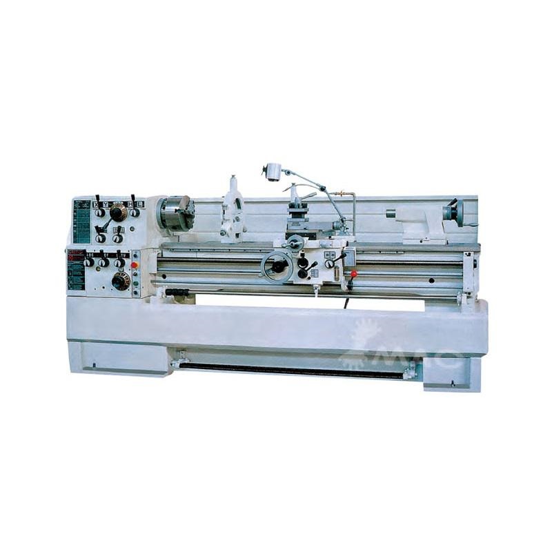 Industrial lathe machine service and maintenance work in a workshop environment