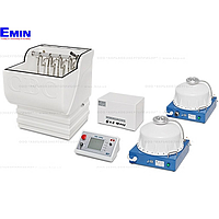 Technician servicing electrical insulation testing equipment in a laboratory or industrial setting